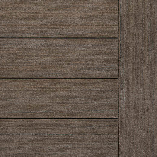 Détail de lames de patio TimberTech aux tons brun foncé