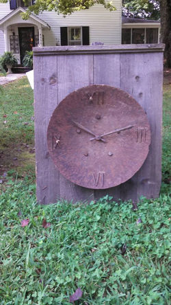 Harrow Disc Clock