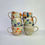 Thumbnail: Sunburst and Blackstone Flower Mugs 