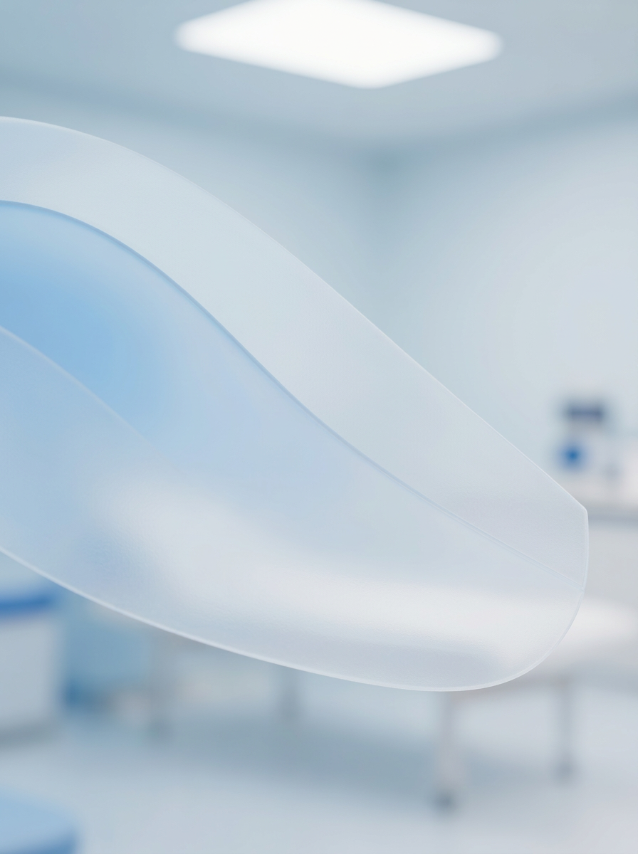 Abstract 3D rendering of a smooth, semi-transparent plastic curve in the foreground. The background is a soft-focus, sterile medical environment in cool blue and white tones.