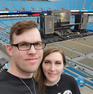 volunteers in a couple's selfie