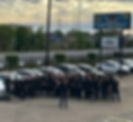 Eagle Collision staff standing in front of the repair center.