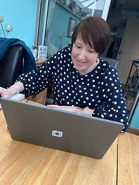 Girl working at laptop computer