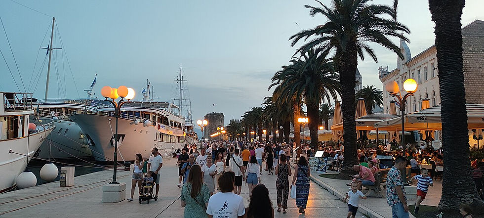 Croatia - Trogir promenade on a June evening, bustling with tourists