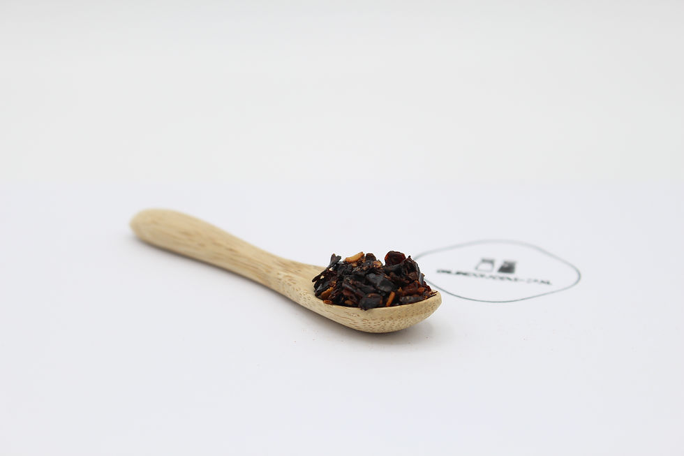 Houten lepel met chipotle chilivlokken