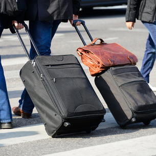 Hauling heavy luggage across the airport