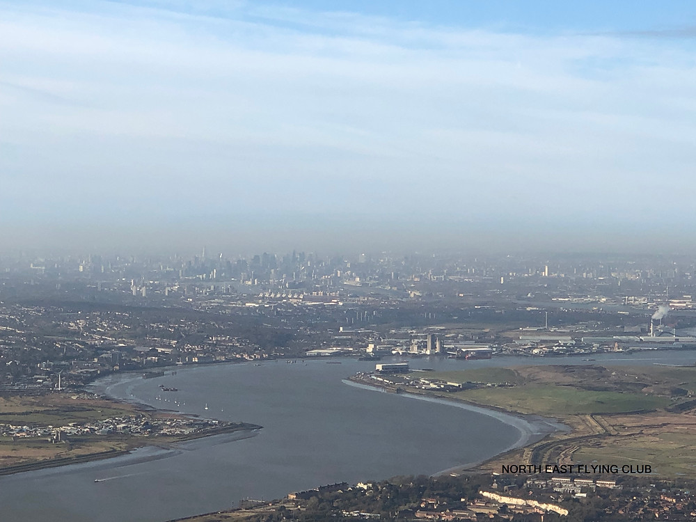 Crossing the River Thames looking at London