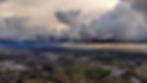 Rain showers from cumulus and towering cumulus clouds