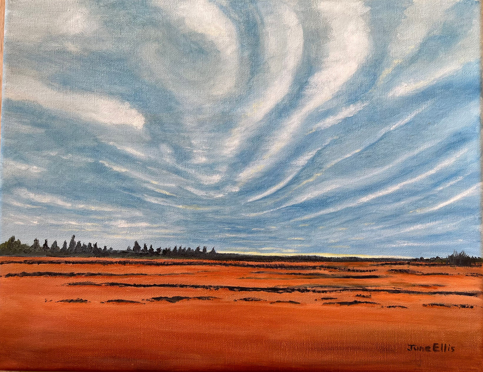Original oil painting of a vibrant sky over a red sandy beach by PEI artist June Ellis