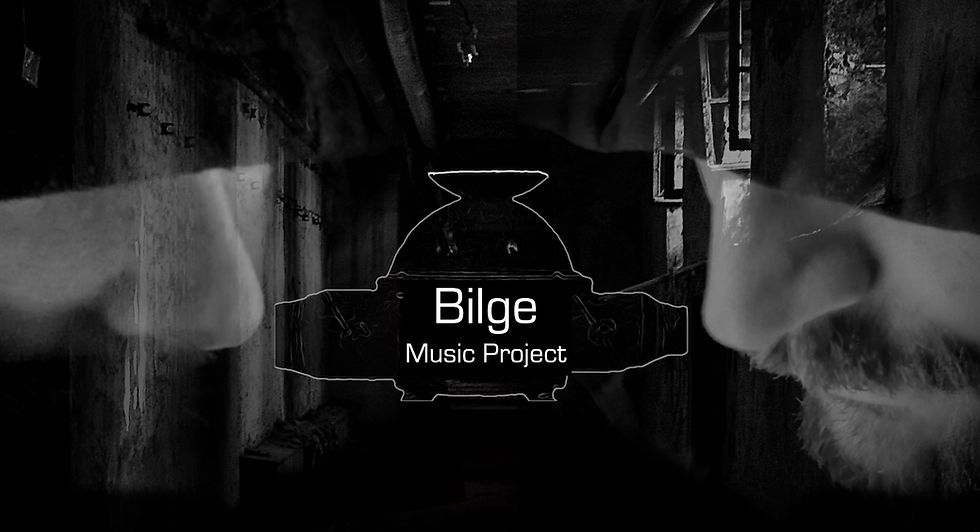 The two members of Bilge Music Project faces look from the side of the frame, their faces partially obscured by hoods. The band logo is in the sentre of the frame