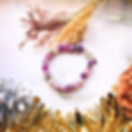 Cracked Agate purple bracelet laying on marble with flowers and leaves Naiya & Yuls Designs
