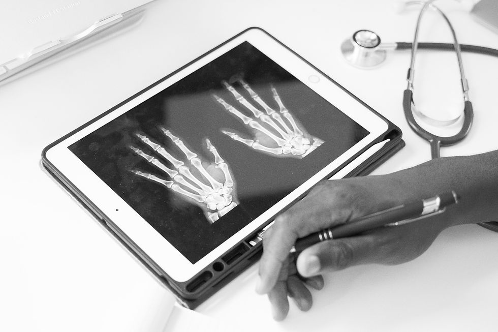 a person holding a tablet_edited_edited.jpg