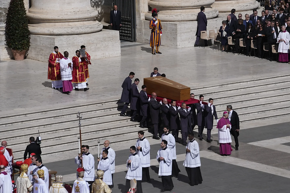The coffin of Pope Francis is carried into St Peter’s Square for his funeral, at the Vatican, Saturday, April 26, 2025.
