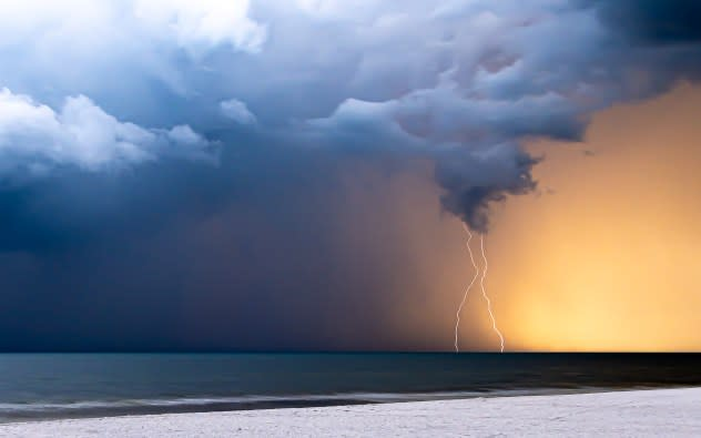 Lightning strikes near a beach in Naples, Florida