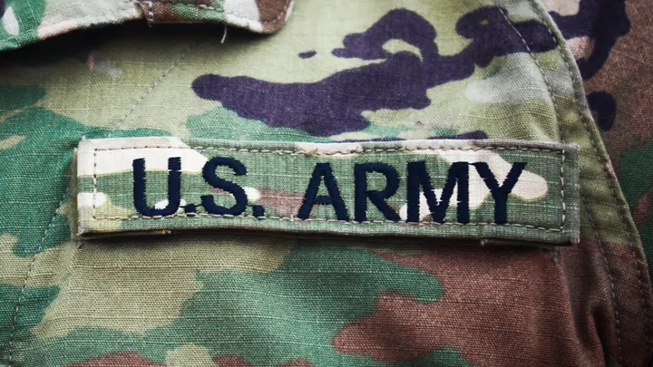 The soldier attempted to recruit a fellow U.S. Army analyst, according to officials.