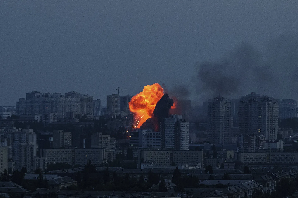 An explosion is seen after a Russian air strike on Kyiv, Ukraine, on Friday, June 6, 2025