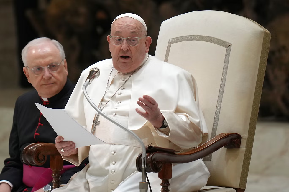 Pope Francis starts reading his speech during his weekly general audience in the Paul VI Hall, at the Vatican, Wednesday, Feb. 12, 2025