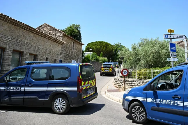 French gendarmes secure a perimeter near the site of a fatal shooting during a wedding party in Goult (Picture: AFP)