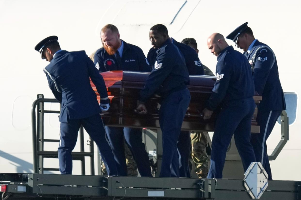 The casket containing the body of Charlie Kirk, the CEO and co-founder of Turning Point USA who was shot and killed on Wednesday is removed from Air Force Two at Phoenix Sky Harbor International Airport, Thursday, Sept. 11, 2025, in Phoenix