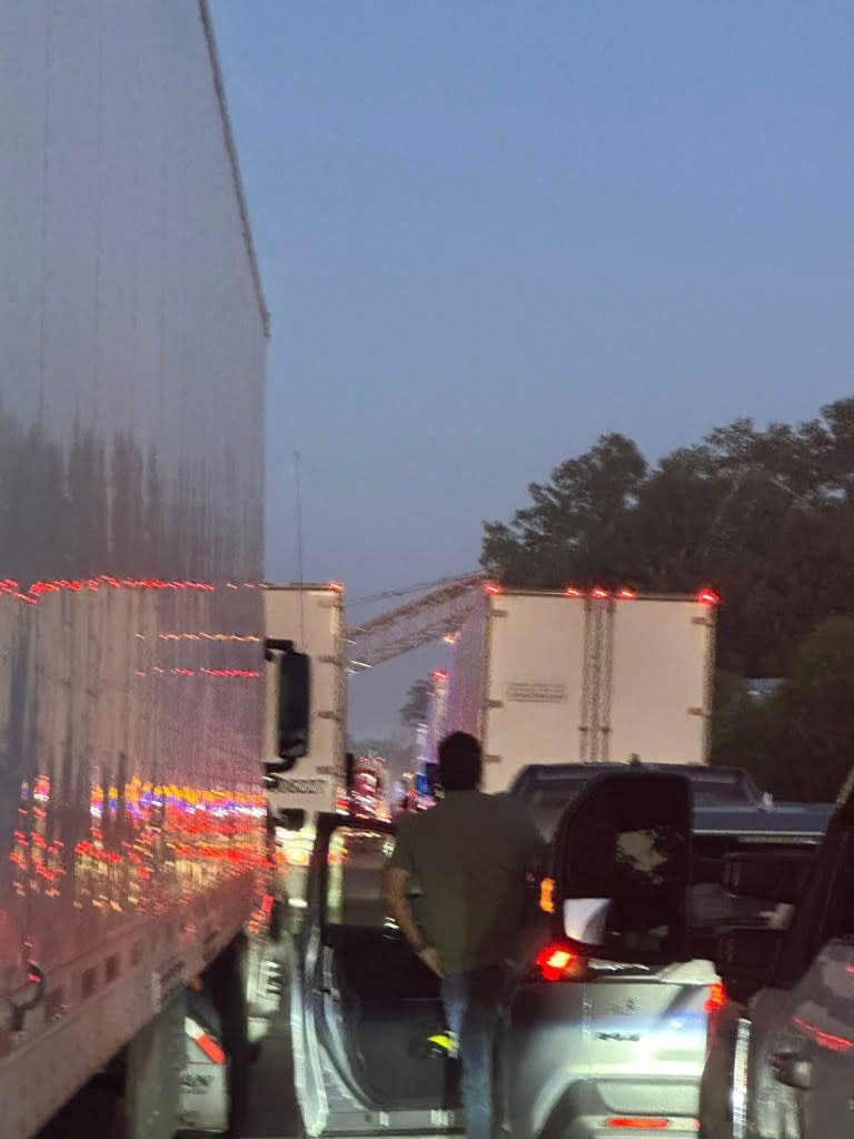 The four crashes left two people injured and caused a major traffic backup