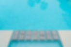 beautiful-luxury-swimming-pool-with-palm-tree.jpg