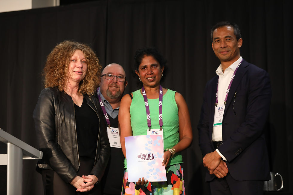 Helen Lamech (second from right) receives the 2025 Jan Baldwin National CDE of the Year award, joined on stage by ADEA President Ann Bush, Jan Baldwin’s nephew Dean Adams, and Kevin Lim of Eli Lilly Australia and New Zealand. Photo: Daryl Charles.
