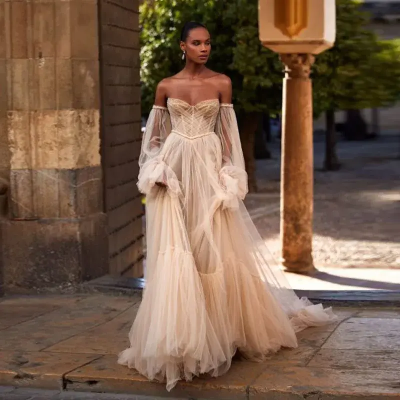 Thumbnail: Long Tulle Sweetheart Strapless Beaded Bridal Dress See Thru Puffy Sleeves Tutu