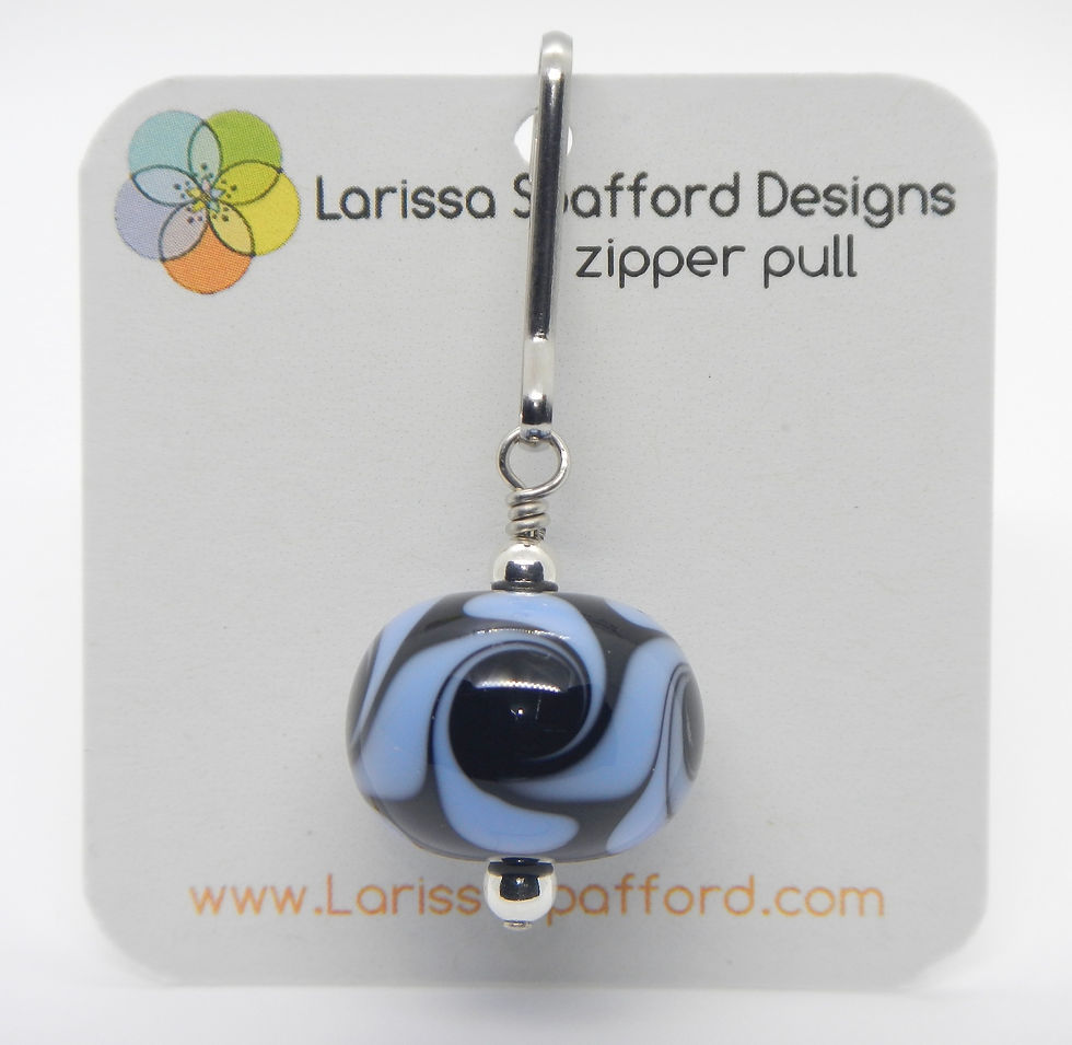 Thumbnail: zipper pull, twist in black and periwinkle blue on tag