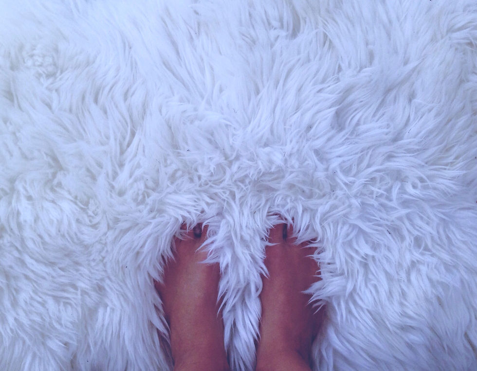 Feet On Fluffy Carpet