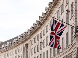 UK flag flying on a historic and presitgious building in London