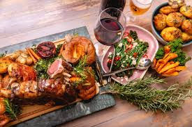 Close-up view of a beautifully plated slow-cooked lamb shank with vegetables at Nonas Restaurant