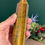 Thumbnail: hand holding Tigers eye tower