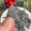 Thumbnail: hand holding a piece of Black Kyanite Crystal Blades