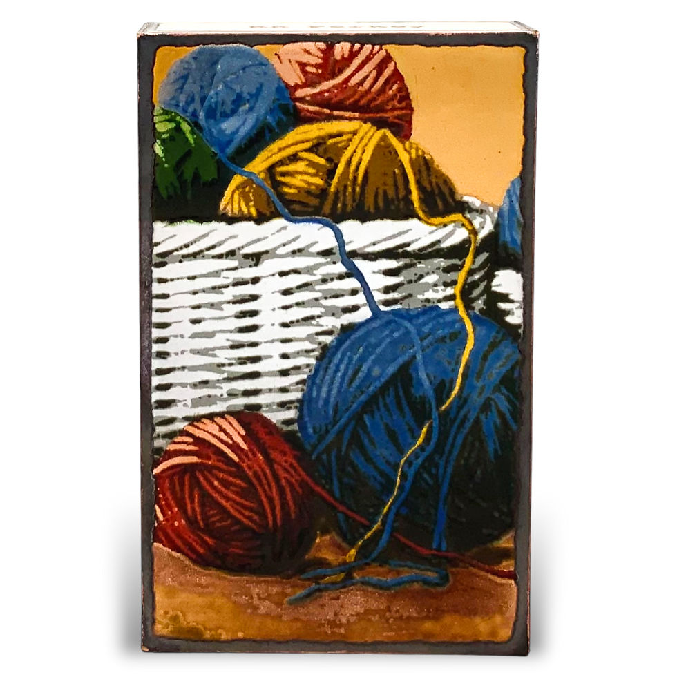 Thumbnail: Balls of colorful yarn in a white basket, crafting background.
