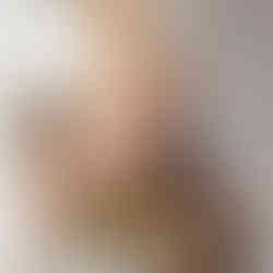 The bride and groom enter the reception together hand-in-hand