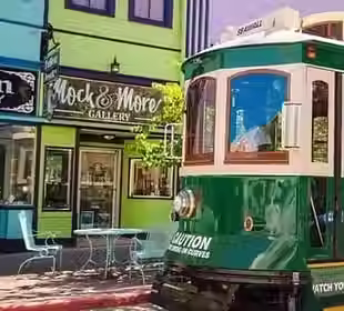 Trolly in front of shop_crop.jpg.avif