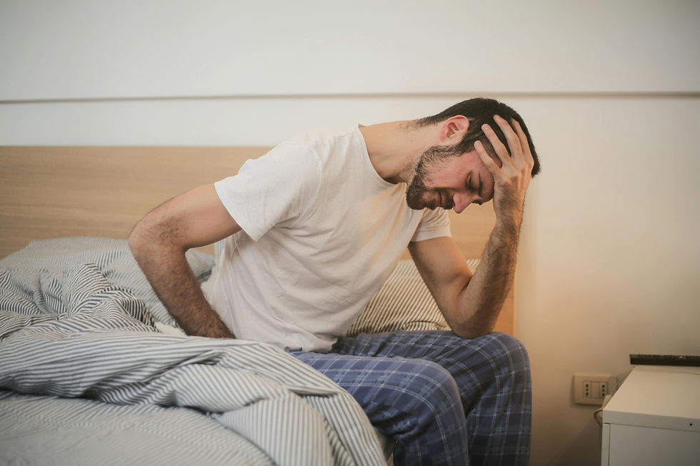sad man with head on hand