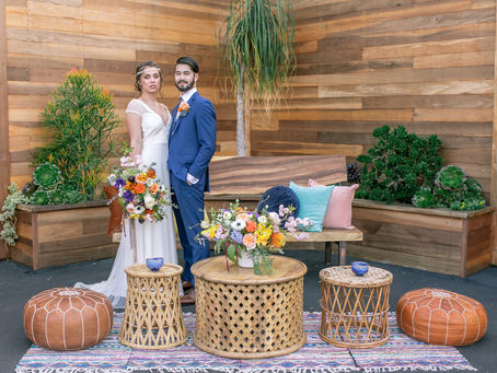 Couple posing at Lot 8 fro their wedding