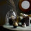 Thumbnail: A Metal Vase top half hammered gold metal, bottom half black, a bulbous shape