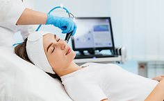 Facial skin care machine in spa clinic for anti-aging or acne treatment. The concept of ae