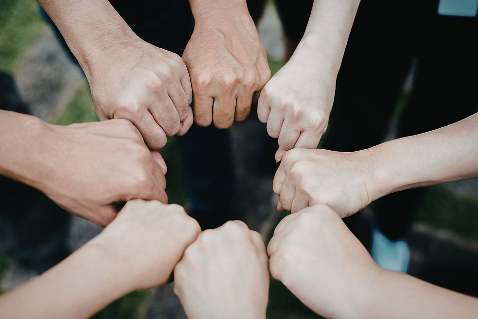 Closed hands in a circle