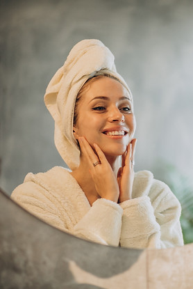woman-home-applying-cream-mask.jpeg