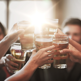 Friends cheersing with drinks