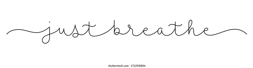 Elegant black script text reads "just breathe" on a white background, conveying calmness and simplicity.