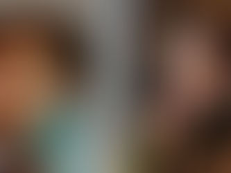 Split portrait of a man in teal light and a smiling woman on a train, both looking off-camera.