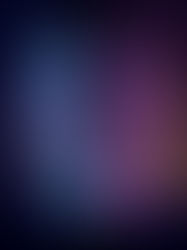 Man with glasses in purple and blue lighting, serious expression, dark background, wearing a black shirt.