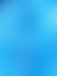 Neon sign with text "LOVE TO BE" and a heart in the center. Glowing blue with a circular design against a dark background.