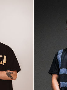 Two men in black shirts; the left has tattoos and clasped hands, in a bright setting, and the right stands in a dim light, serious expression.