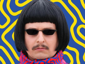 Stylized portrait of a person in a black bob wig and sunglasses, with a mustache and red-blue scarf, against a blue-yellow wavy backdrop.