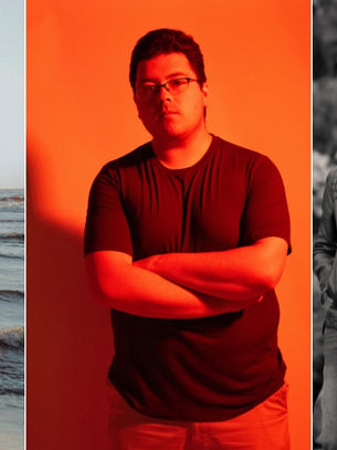 Three men in different settings: one by the sea in black attire, one in red light with crossed arms, and two in a black-and-white wooded area, one adjusting his jacket.